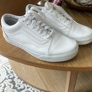 White leather kids vans.